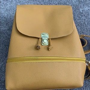 A yellow mustard backpack